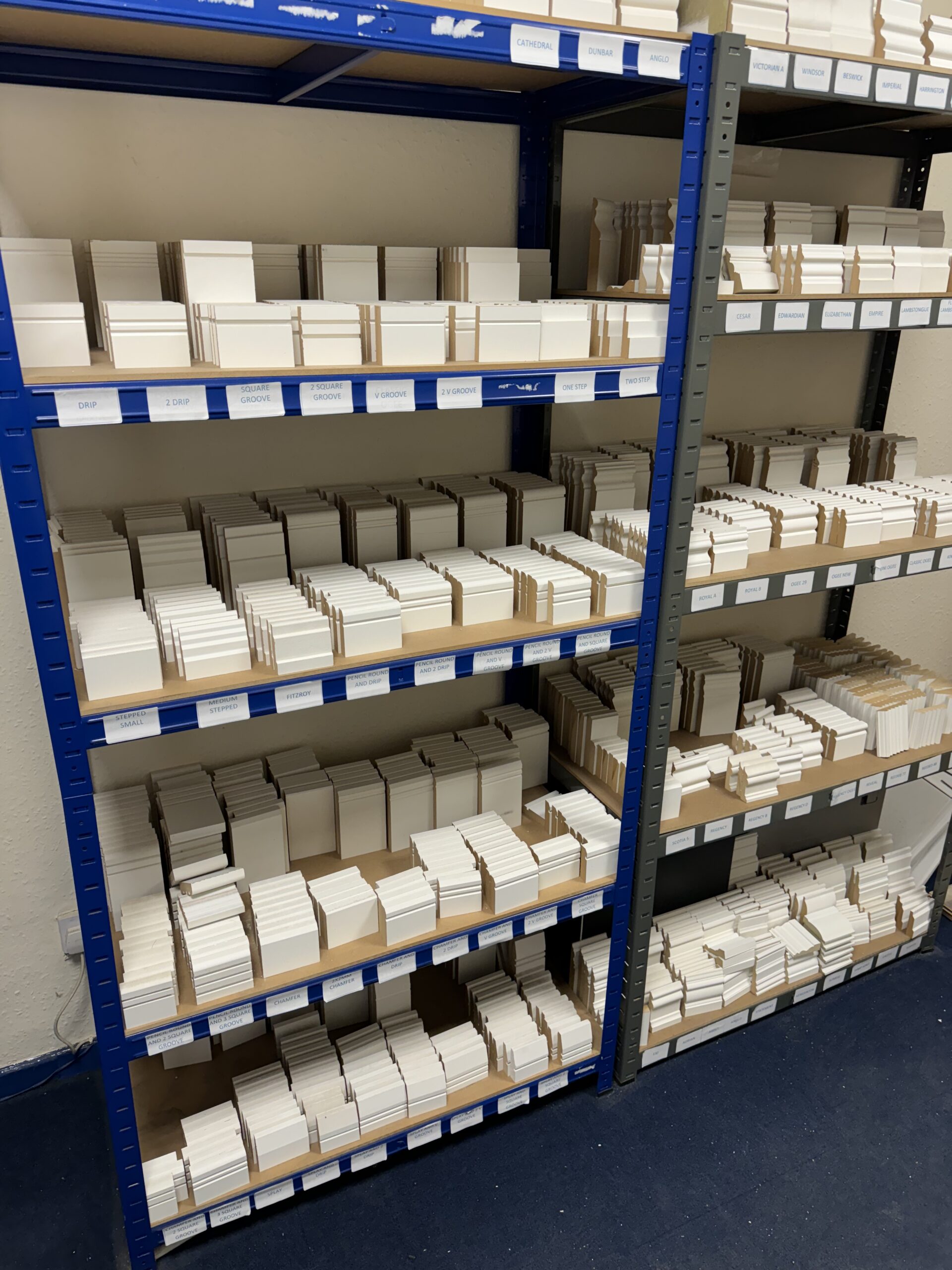 Shelves stocked with skirting board and architrave profile samples