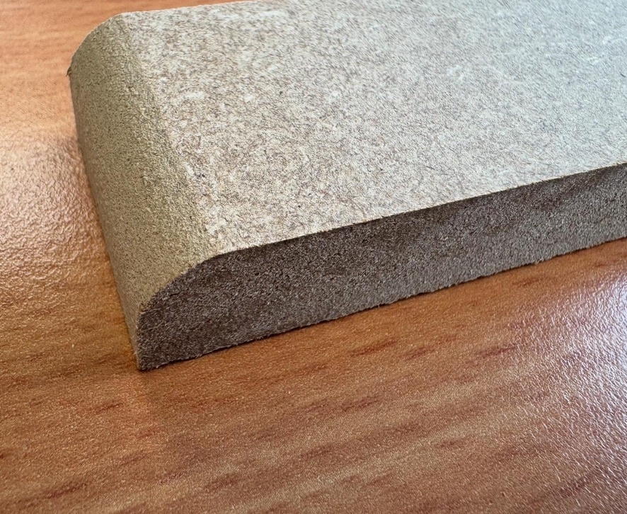 Close-up of unprimed raw MDF skirting board